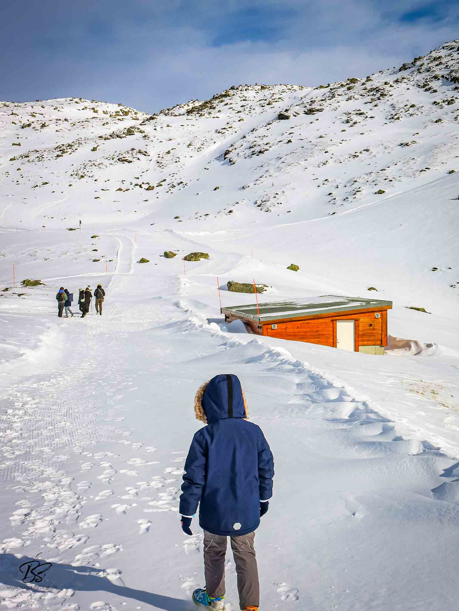 Snow-covered mountain trail at Loen Skylift with icy patches