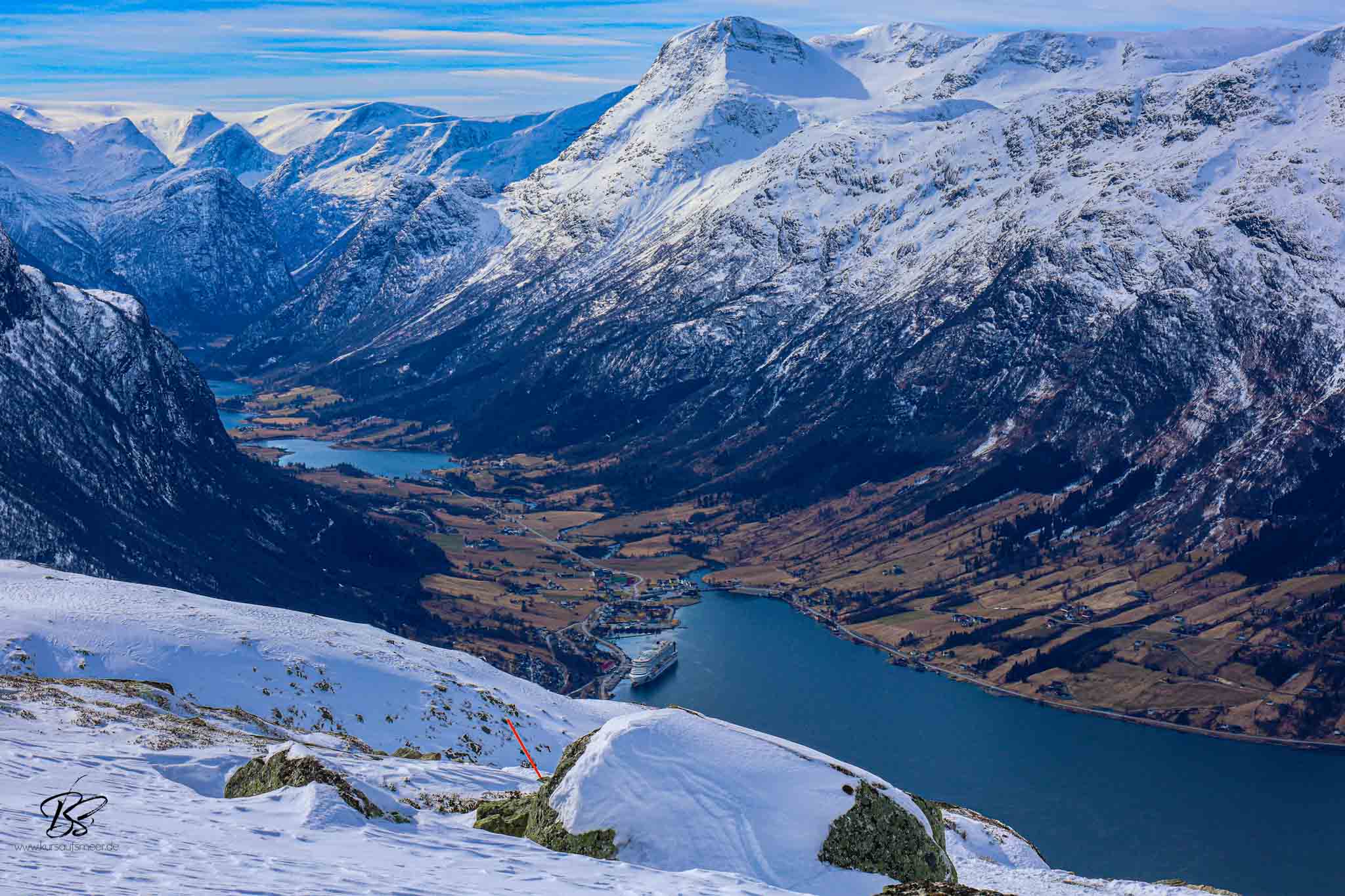 View from the Loen Skylift summit with snow and fjord below