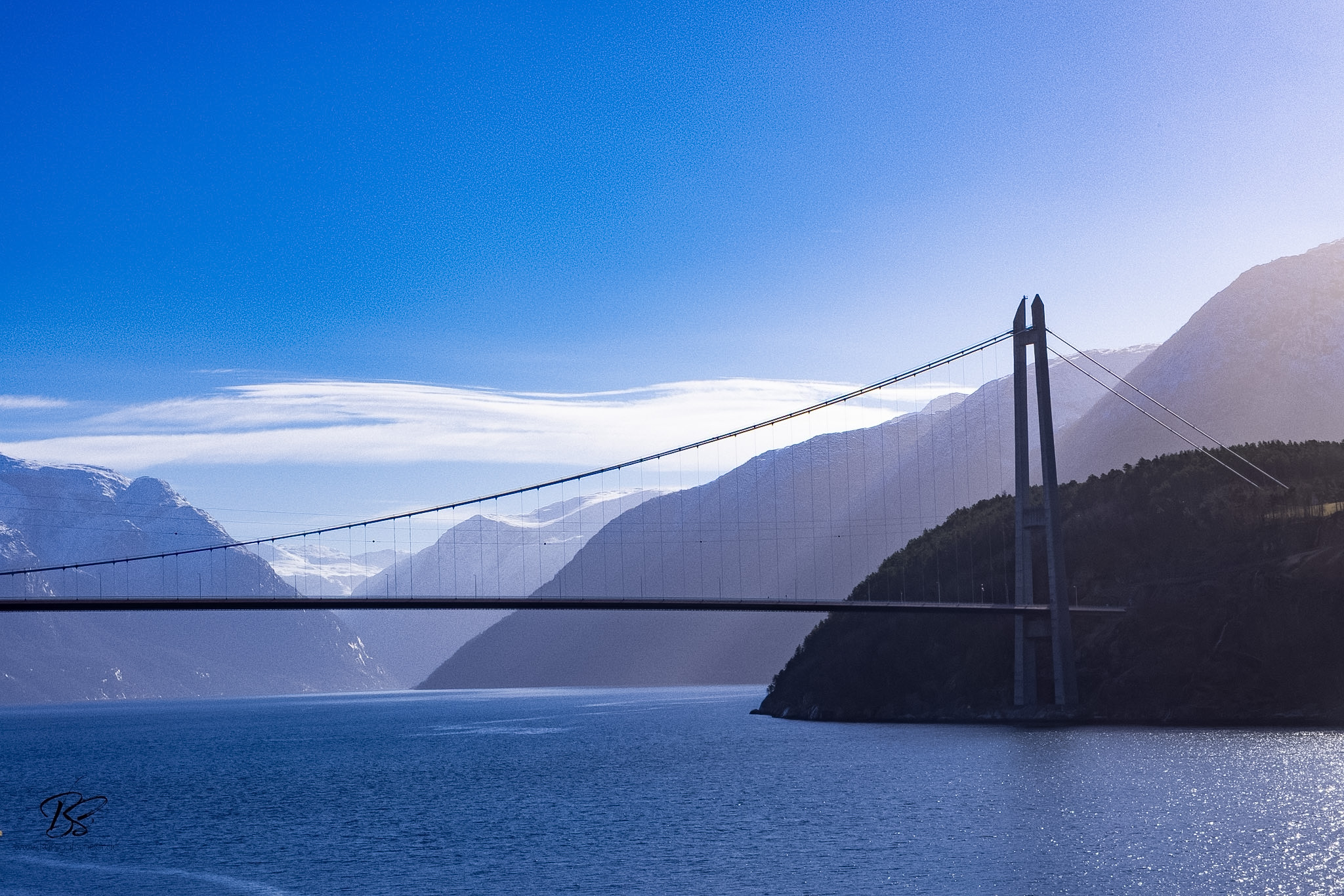 AIDAperla sailing into Eidfjord through the Hardangerfjord at sunrise