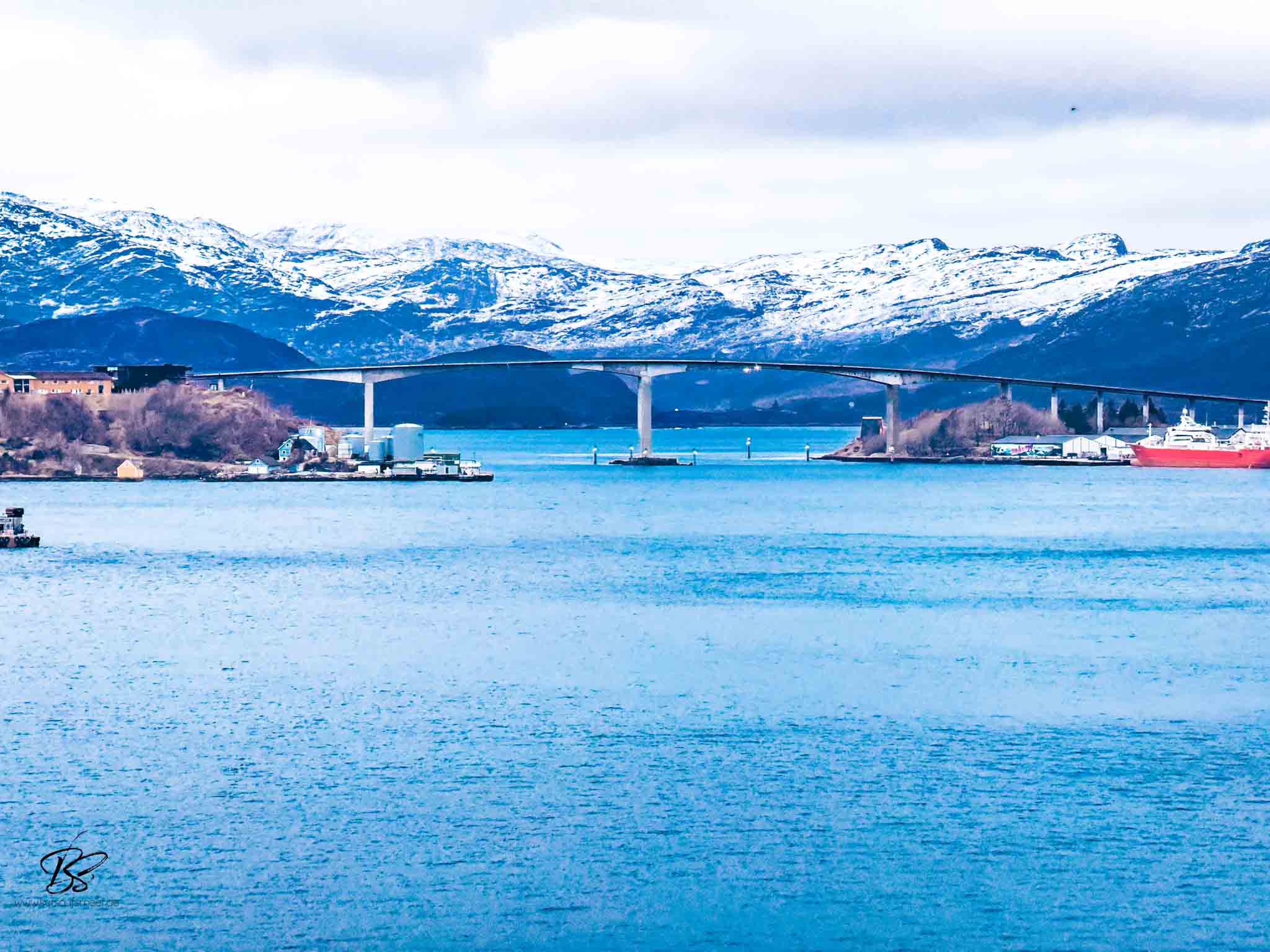 Arrival into Måløy harbour with snow and mist, Western Norway
